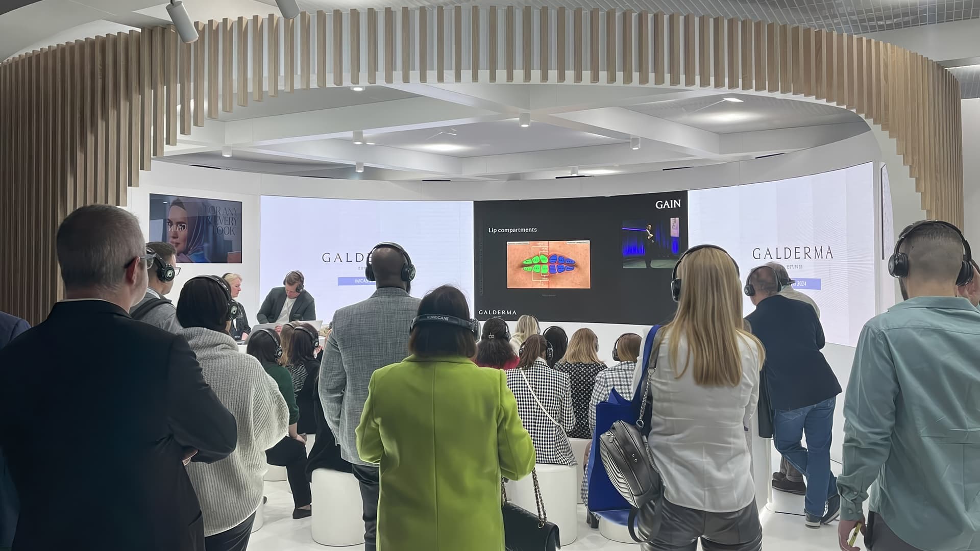 Hurricane_Galderma_Paris_exhibition_silent_disco_system_headphones_LCD_screen